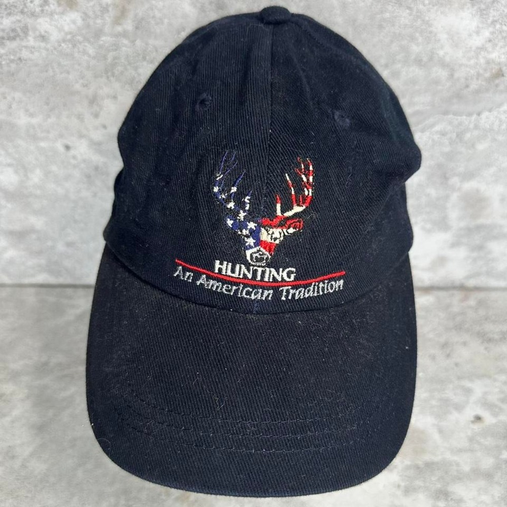 Black adjustable hunting cap with red,‎ white, and blue flag design